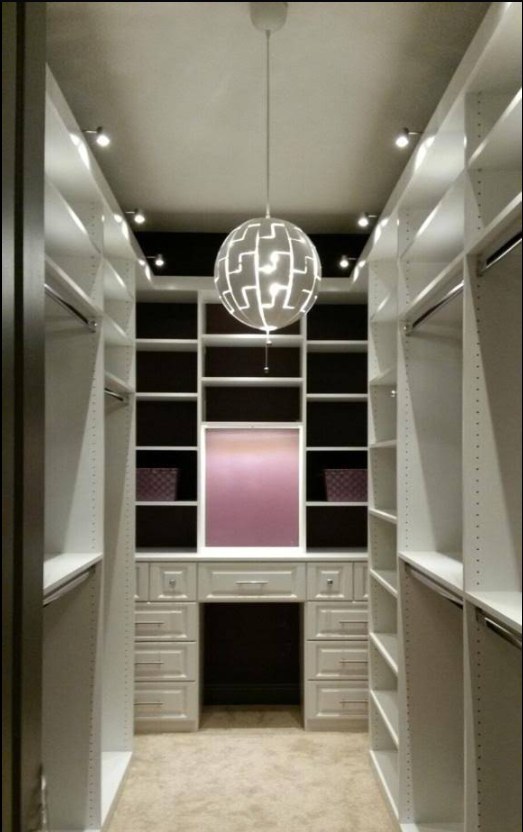 Lit white boutique closet